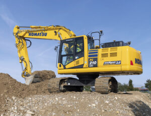 An excavator digging on a site.